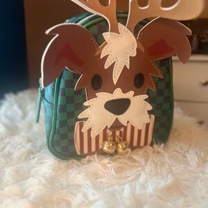Green Checkered Backpack with Reindeer Design